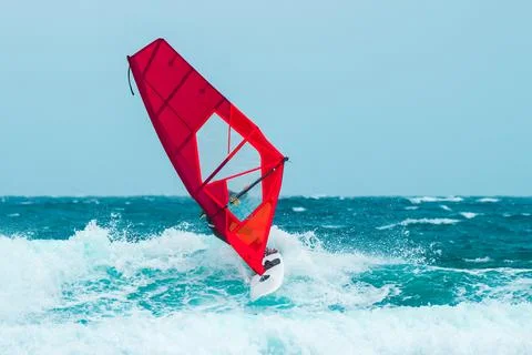 Windsurf with red sail Stock Photos