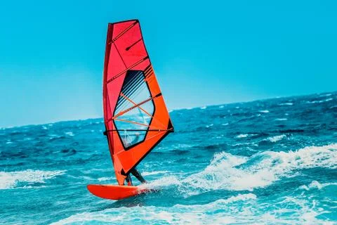 Windsurf riding the waves Stockfoto's