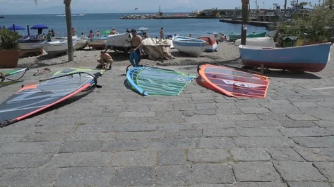 Windsurf sail maintenance Stock Footage 90062242