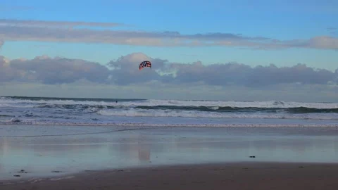 Windsurfer on Bamburgh beach Stock Footage 321473350