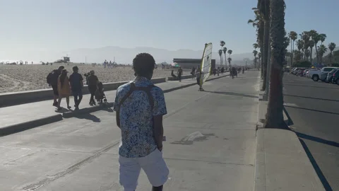 Windsurfer at the beach pathway Video stock 155620350