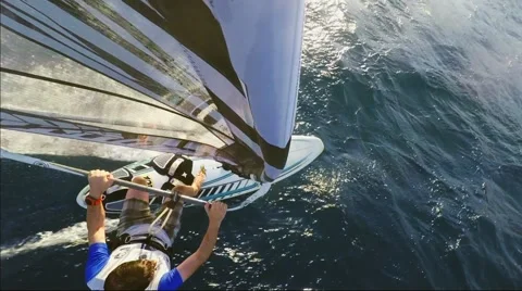 Windsurfer coming back to shore, view from the top - mast view/ Video stock 68999041