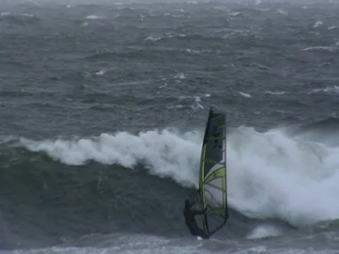 Windsurfer crashes into Wave Stock Footage 10767679