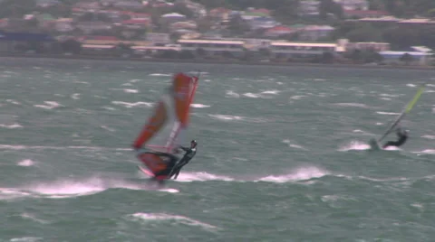 Windsurfer crossing bay Video stock 1035460