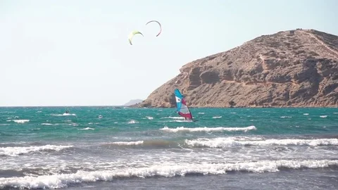 Windsurfer gliding in the sea Stock Footage 80614551
