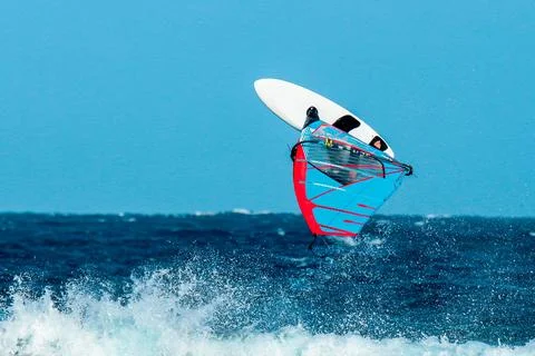 Windsurfer making an acrobatic jump Stock Photos