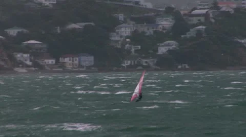 Windsurfer playing in rough conditions Video stock 8984244