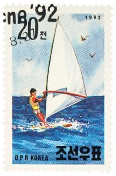 Windsurfer on postage stamp Stock Photos