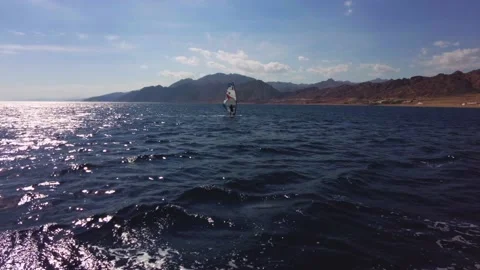 Windsurfer in red sea Stock Footage 157876905