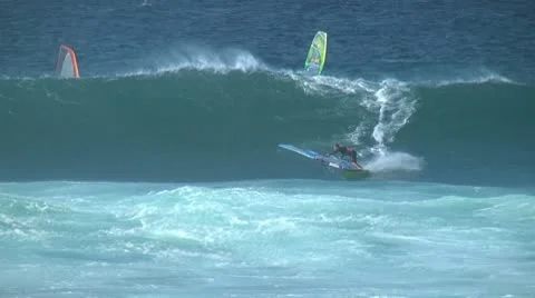 Windsurfer riding a wave Stock Footage 10686849