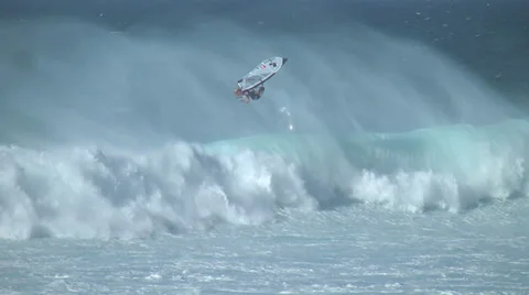 Windsurfer riding a wave at Hookipa Maui, Hawaii Stock Footage 32326835