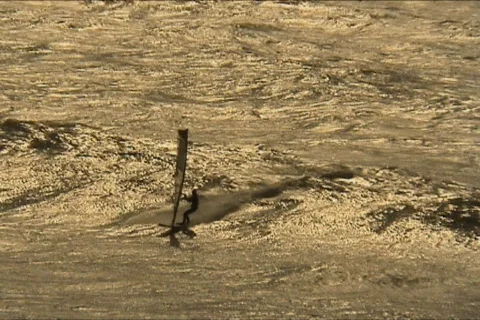 Windsurfer sailing fast Stock Footage 100402