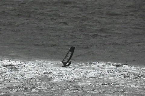 Windsurfer sailing fast Stock Footage 121106