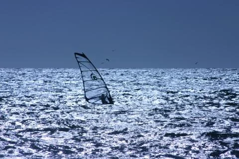 Windsurfer silhouette Stock Photos