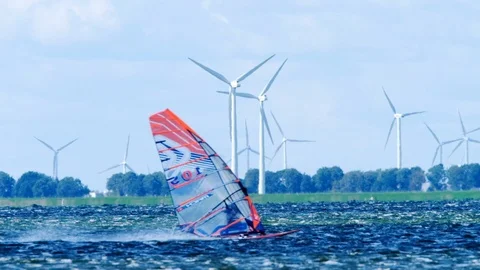 Windsurfer slow motion storm wind and windmill on lake dscf3827HD Stock Footage 94894793
