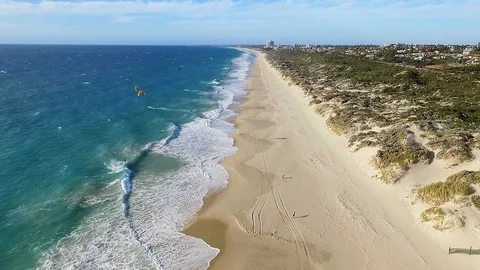 Windsurfers beach flyover summertime travel and holidays Stock Footage 99463532
