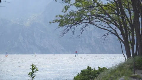 Windsurfers on the Garda Lake Stock Footage 110880243