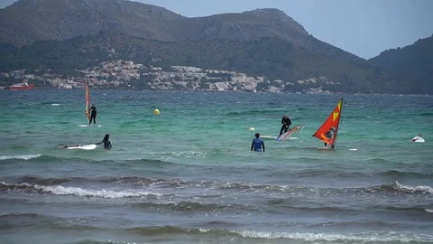 Windsurfers at sea Stock Footage 128351869