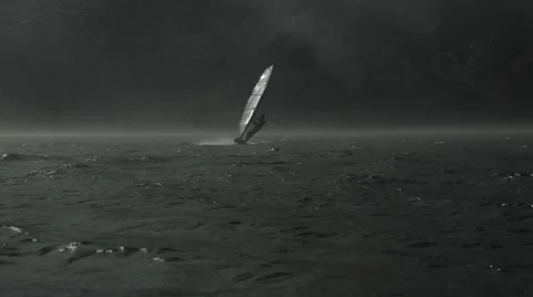 Windsurfing on Alpine Lake in Storm Video stock 47835539