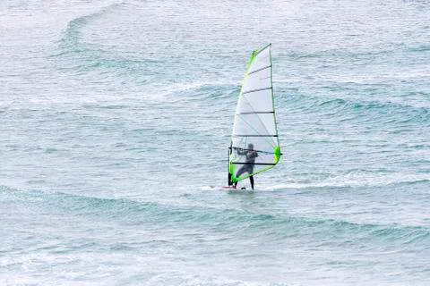 Windsurfing on the background of the sea Stock Photos