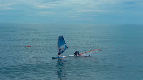 Windsurfing beginners taking the first steps in learning Stock Footage 64904102