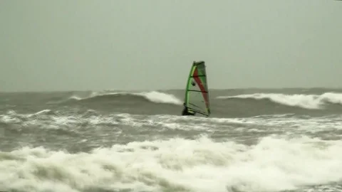 Windsurfing in high waves Stock Footage 72920476