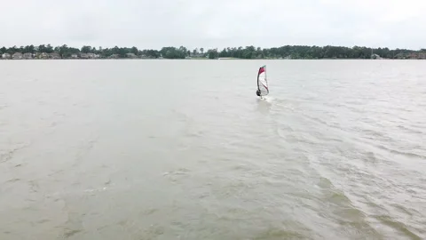 Windsurfing on a lake drone tracking Video stock 131007583