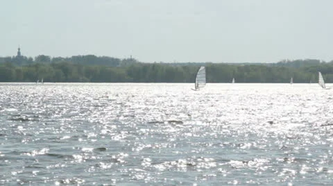 Windsurfing on a lake Stock Footage 24563132