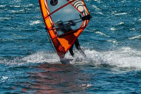 Windsurfing on the lake Stock Photos