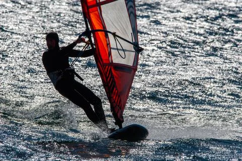Windsurfing on the lake Stock Photos
