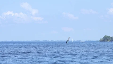 Windsurfing on the river Stock Footage 109478287