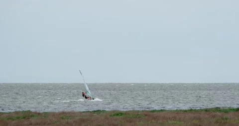 Windsurfing in the sea Stock Footage 133720870