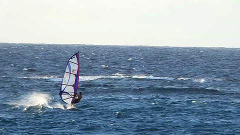 Windsurfing Stormy Waves at The Beach Stock Footage 129205558