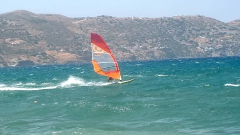 A windsurper flies in slowmotion Stock Footage 115596244