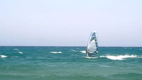 A windsurper in slowmotion Stock Footage 115596321