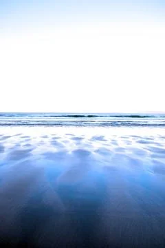 Windswept winter beach view Stock Photos