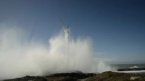 Windturbine gets battered by a huge wave, Boulogne-sur-Mer Stock Footage 289905616