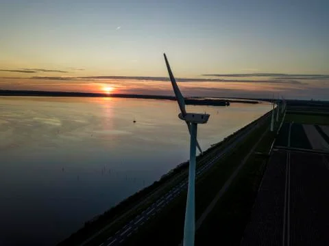 Windturbine with sunset Stock Photos