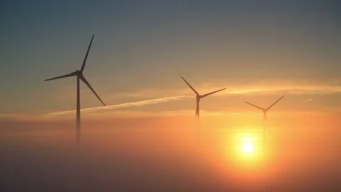 Windturbines at sunrise Stock Footage 132053516