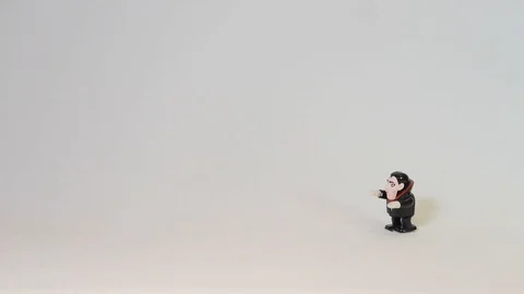 Windup Dracula Walking White Background Stock Footage 100691209