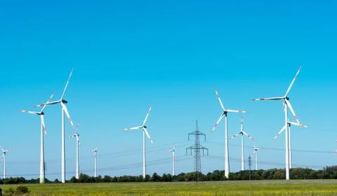 Windwheels and overhead cables in Germany Stock Photos