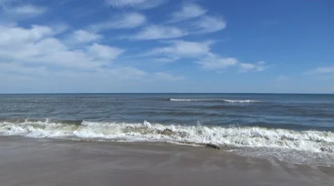 Windy Beach Waves Crashing pan tilt Stock Footage