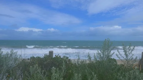 Windy day at the beach in winter (out of focus) Ocean Stock Footage 93224246