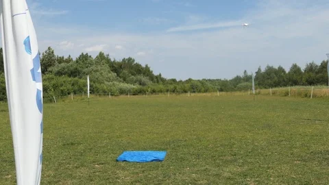 Windy day, drone has trouble landing Stock-Footage 120130017
