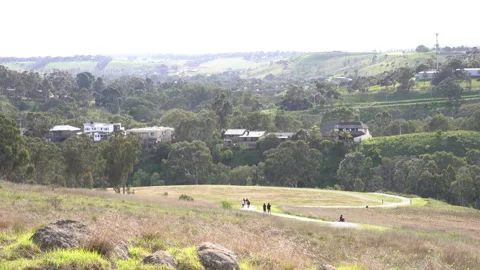 A windy day during spring time, walking down hill peacefully with the lover o Stock Footage 161001573