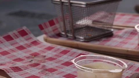 Windy day, empty tray of snacks Stock Footage 231912357
