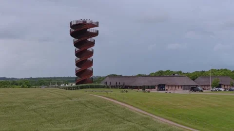Windy Day at Marsk Tower as Wind Creates Patterns Across the Grasslands Stock Footage 346257701
