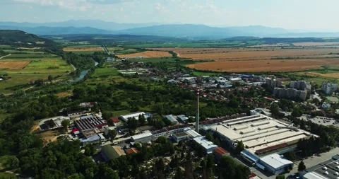 Windy Day In Small River Side Town Large Hay Fields Hot Summer Day Aerial Still 库存影片 300494146