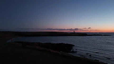 Windy Hyperlapse of Red Sunset Over Ruby Bay, Fife 2 Stock Footage 326973001