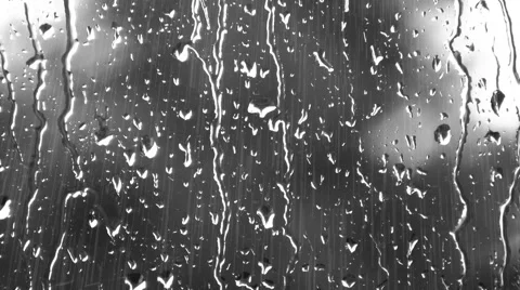 Windy Raindrops on Window Stock Footage